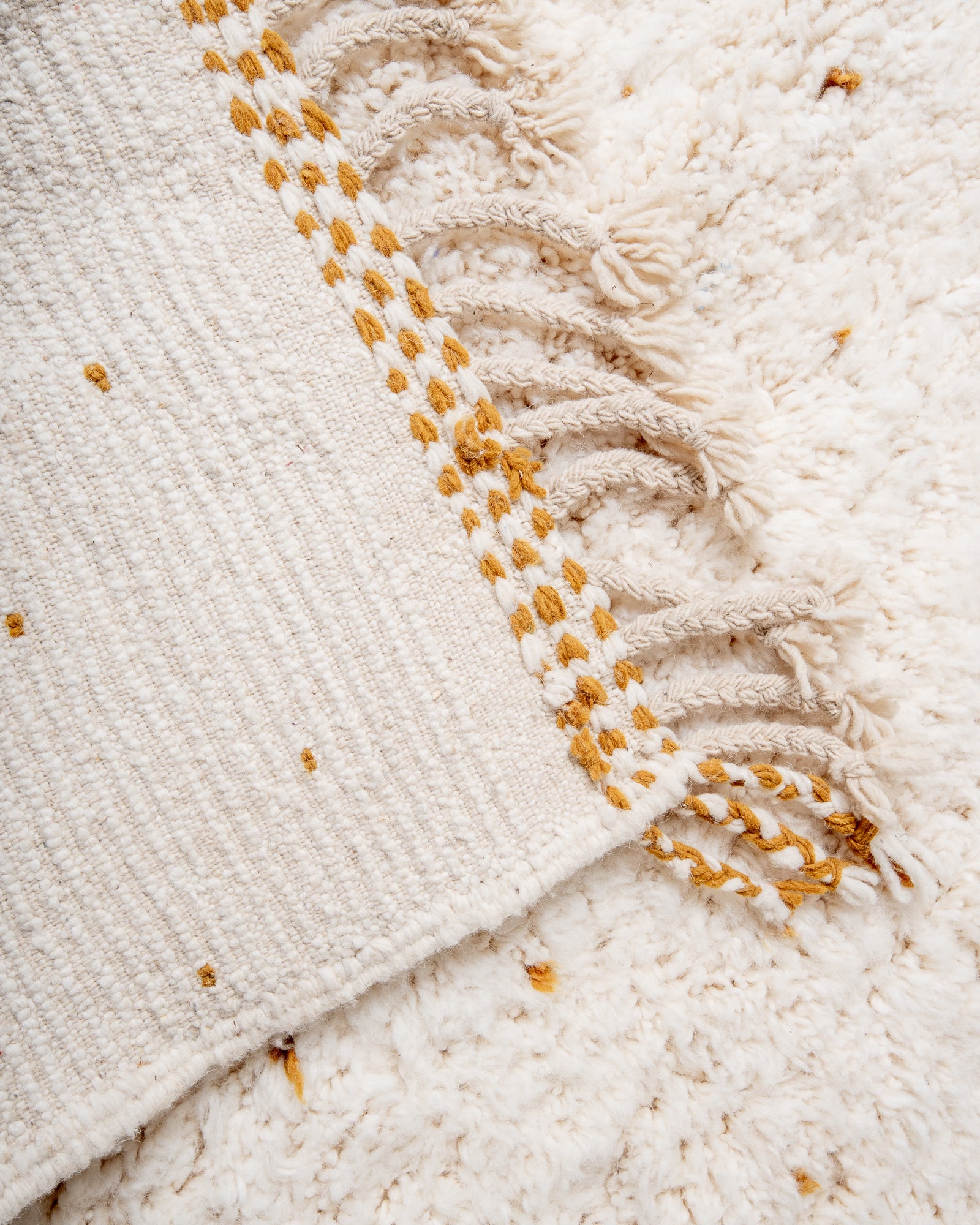 Modern, designer, handcrafted Berber rug from Morocco. Beniourain carpet with beautiful colours and patterns and fluffy wool texture.